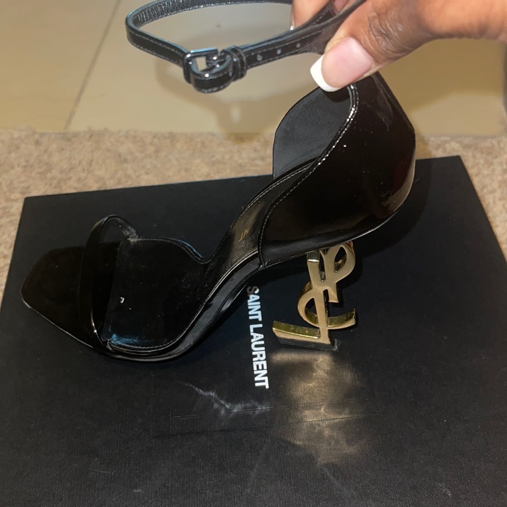 Black and gold YSL heels